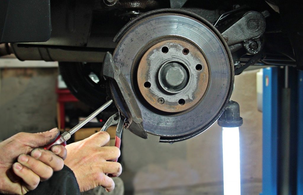 Mechanic servicing a wheel