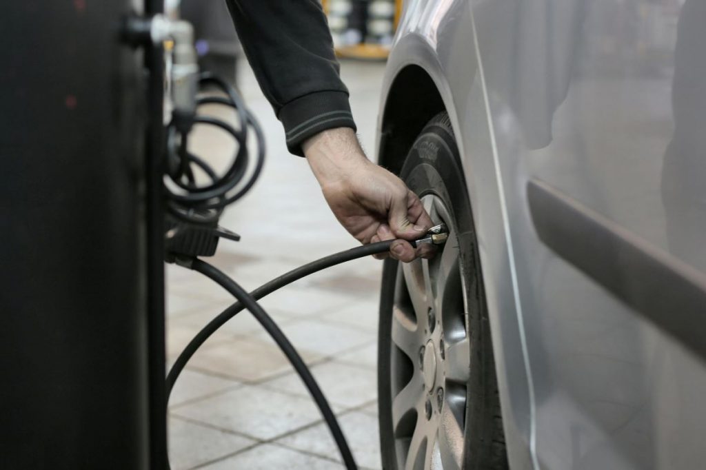 image of a tyre being pumped with air